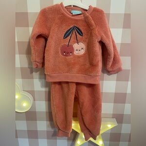 Baby girl, 2-piece pink fuzzy set. Long Sleeve and pants with cute cherries.